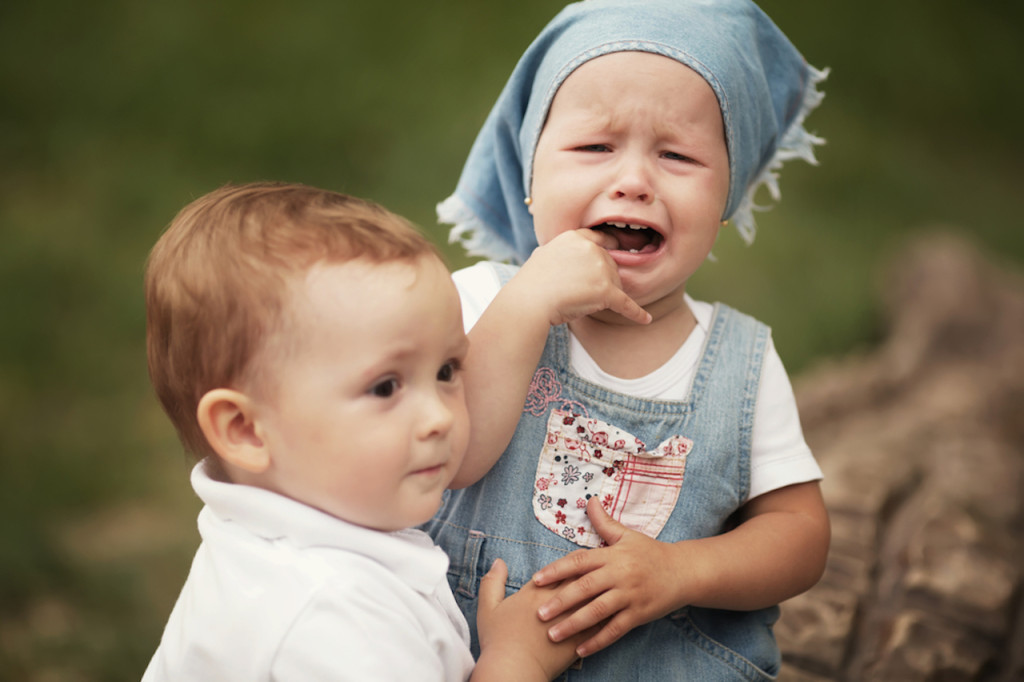 Siblings fighting copy low res